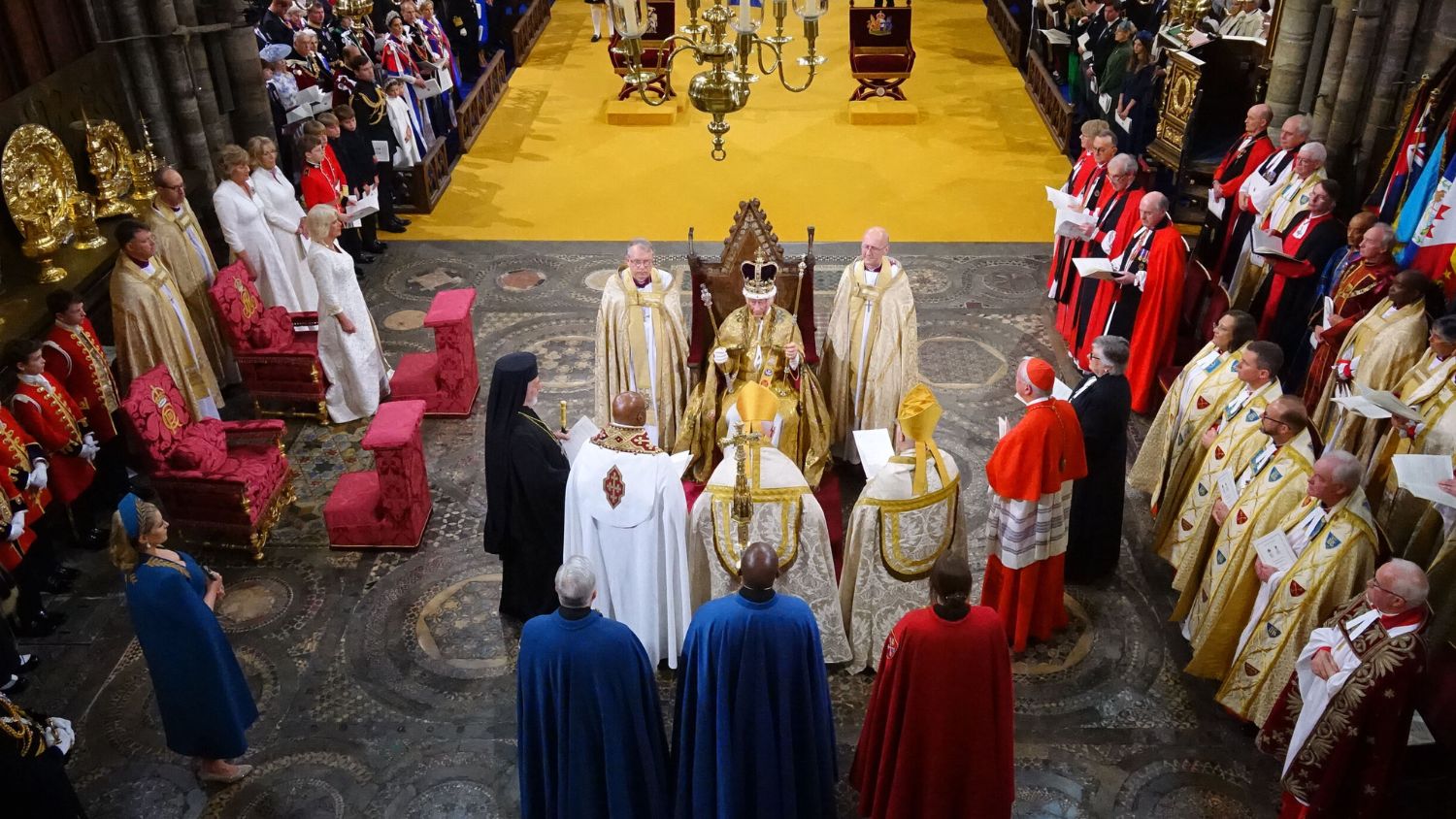 King Charles III is crowned by the archbishop of Canterbury during his coronation ceremony in Westminster Abbey, London [Jonathan Brad via Reuters]